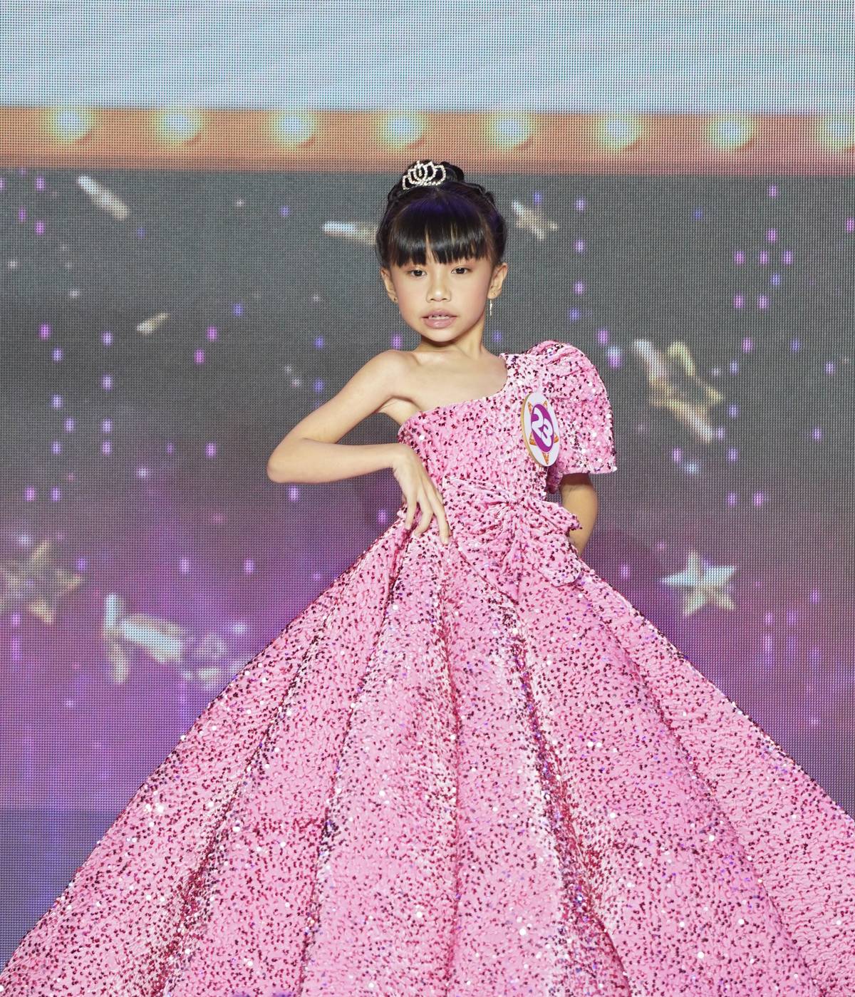 Girl Grand Winner Erisha Lynn Alayon of SM City Bacolod stuns in her formal attire.